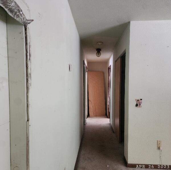10385 Ritts Mill Road Shingletown, CA 96088 - Photo 9 of 29 a view of hallway with closet and a couch