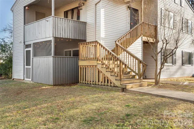 a view of a house with a fence