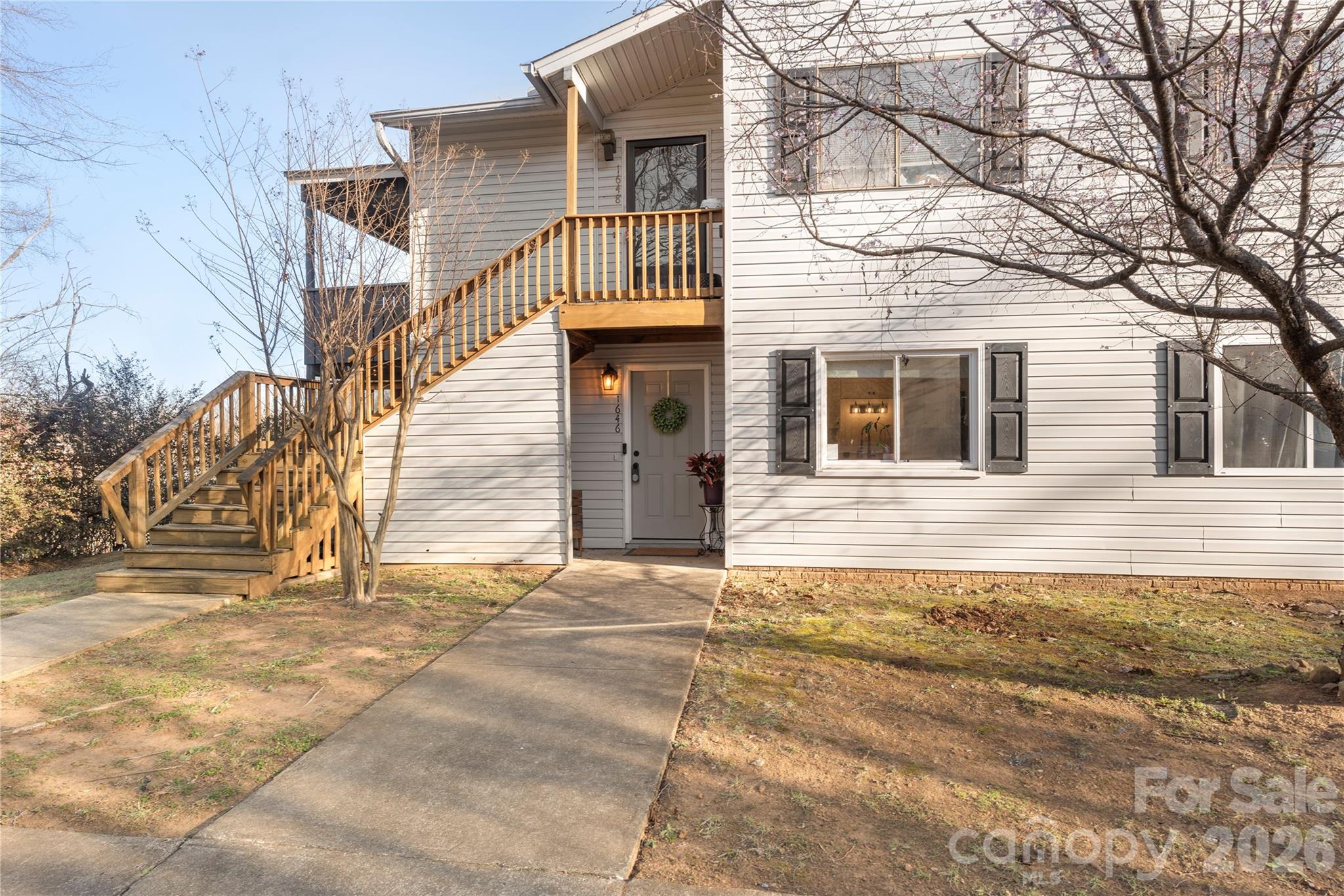 1646 Hunters Trail Rock Hill, SC 29732 - Photo 32 of 36 a house that has a tree in front of it