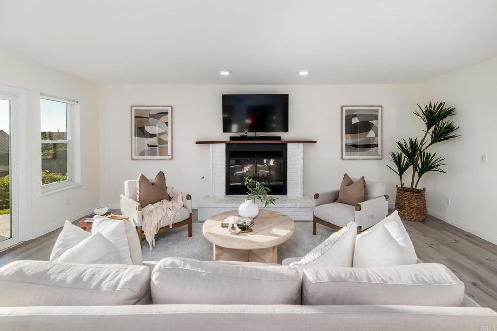 2515 Luciernaga Street Carlsbad, CA 92009 - Photo 16 of 58 a living room with furniture and a flat screen tv