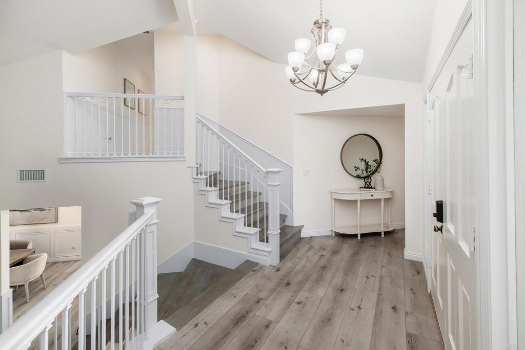 2515 Luciernaga Street Carlsbad, CA 92009 - Photo 23 of 58 a view of livingroom with furniture and wooden floor