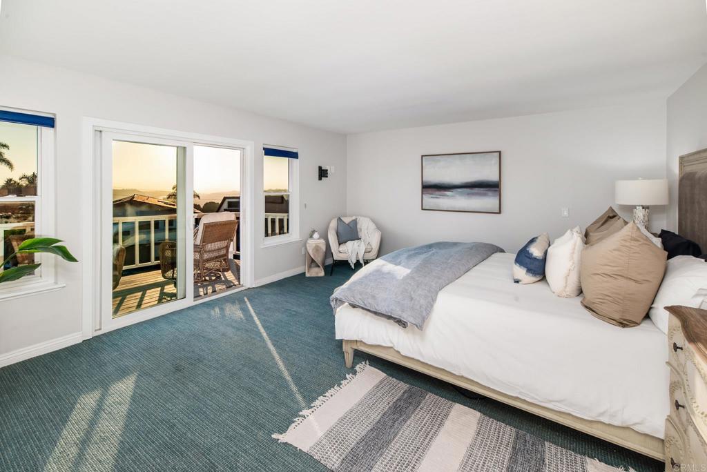 2515 Luciernaga Street Carlsbad, CA 92009 - Photo 25 of 58 a bedroom with a bed and a large window