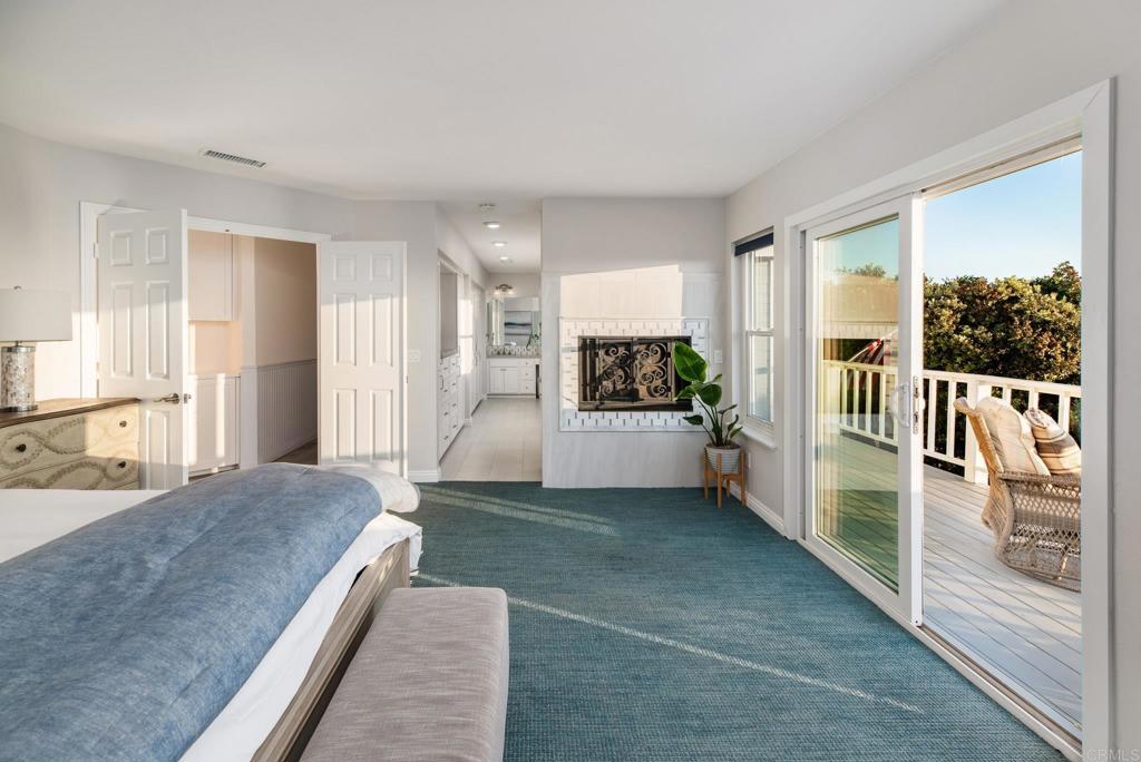 2515 Luciernaga Street Carlsbad, CA 92009 - Photo 26 of 58 a view of a living room and a large window