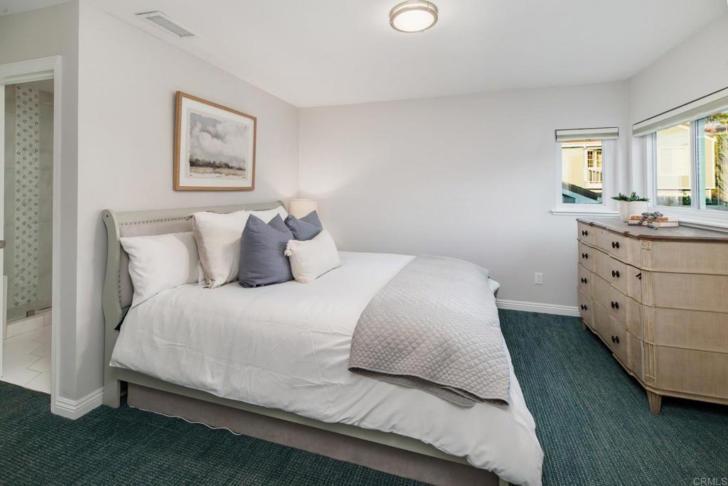 2515 Luciernaga Street Carlsbad, CA 92009 - Photo 29 of 58 a bedroom with a bed and window