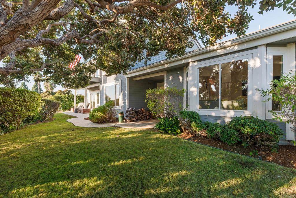 2515 Luciernaga Street Carlsbad, CA 92009 - Photo 43 of 58 a view of a house with backyard and sitting area