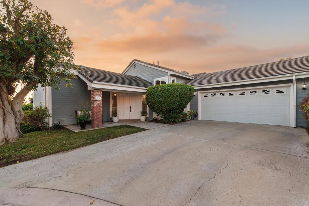 2515 Luciernaga Street Carlsbad, CA 92009 - Photo 49 of 58 front view of a house with a yard