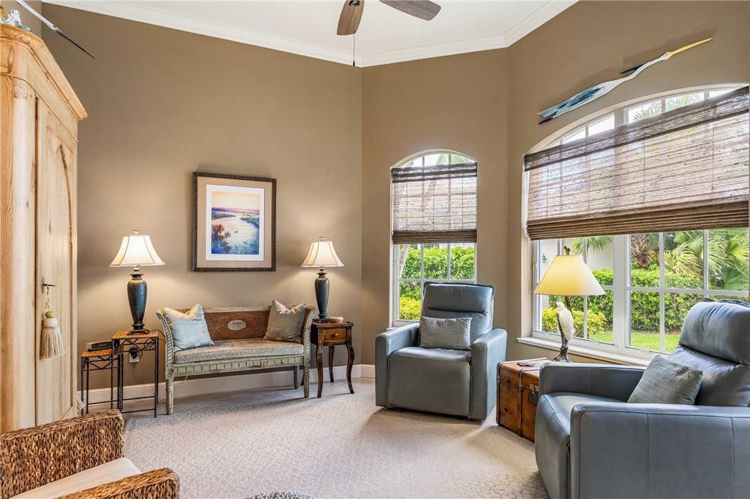 1286 Riverside Place Vero Beach, FL 32963 - Photo 17 of 36 a living room with furniture and a large window