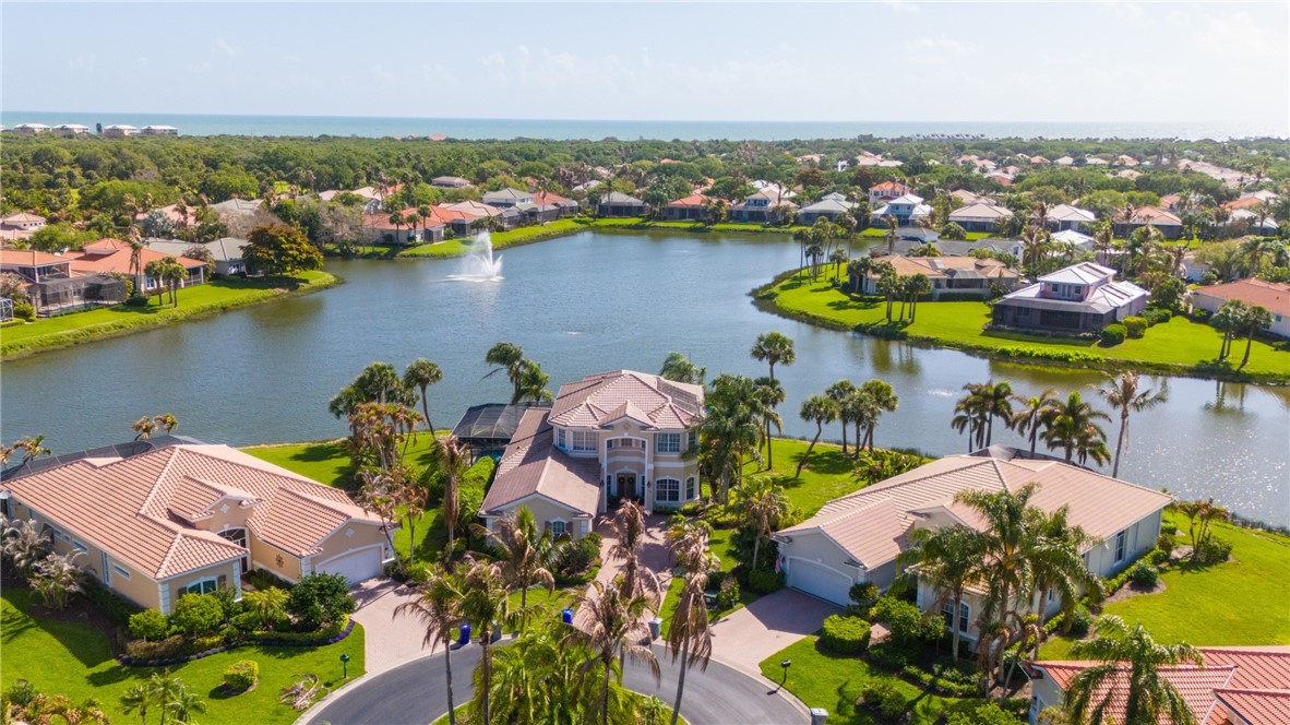 1286 Riverside Place Vero Beach, FL 32963 - Photo 2 of 36 an aerial view of lake and residential houses with outdoor space