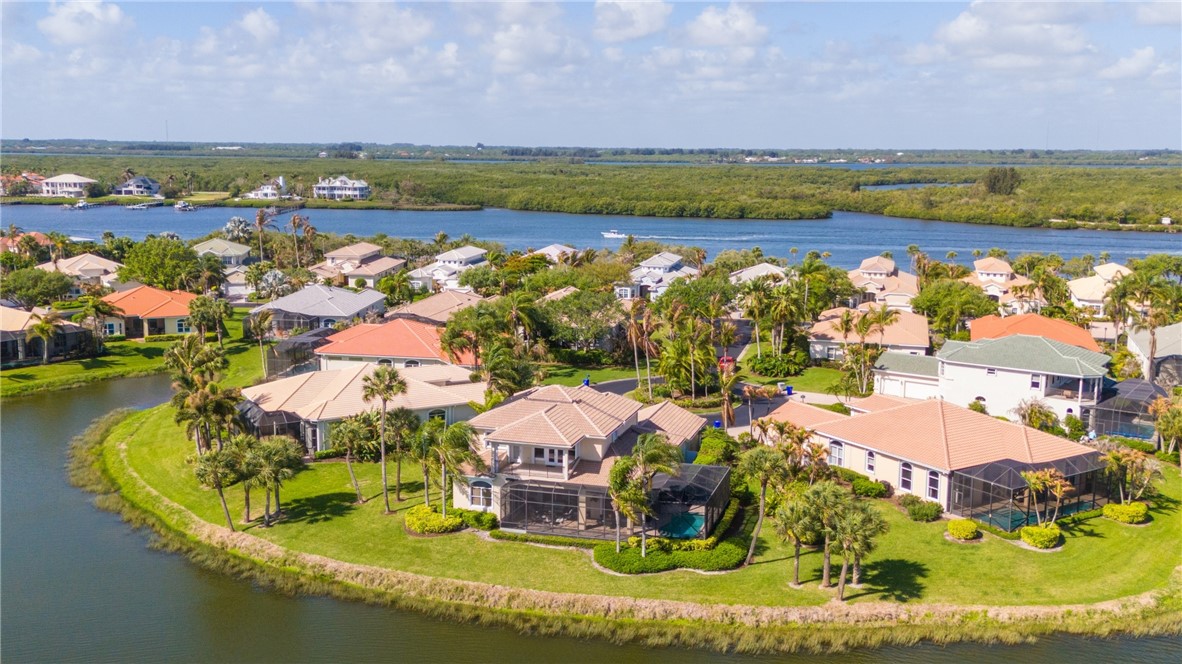 1286 Riverside Place Vero Beach, FL 32963 - Photo 3 of 36 an aerial view of residential houses with outdoor space and swimming pool