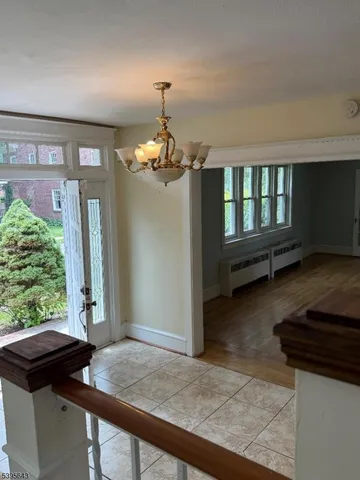 a view of a livingroom with furniture and window