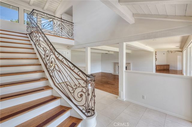 wooden floor in a hall with an outdoor space