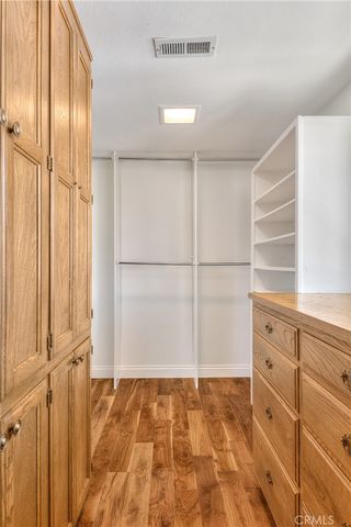 an aerial view of a house with outdoor space lake view and boat