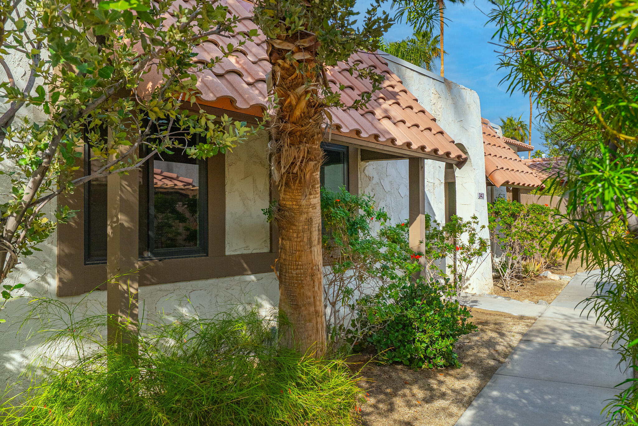 front view of a house with a small yard