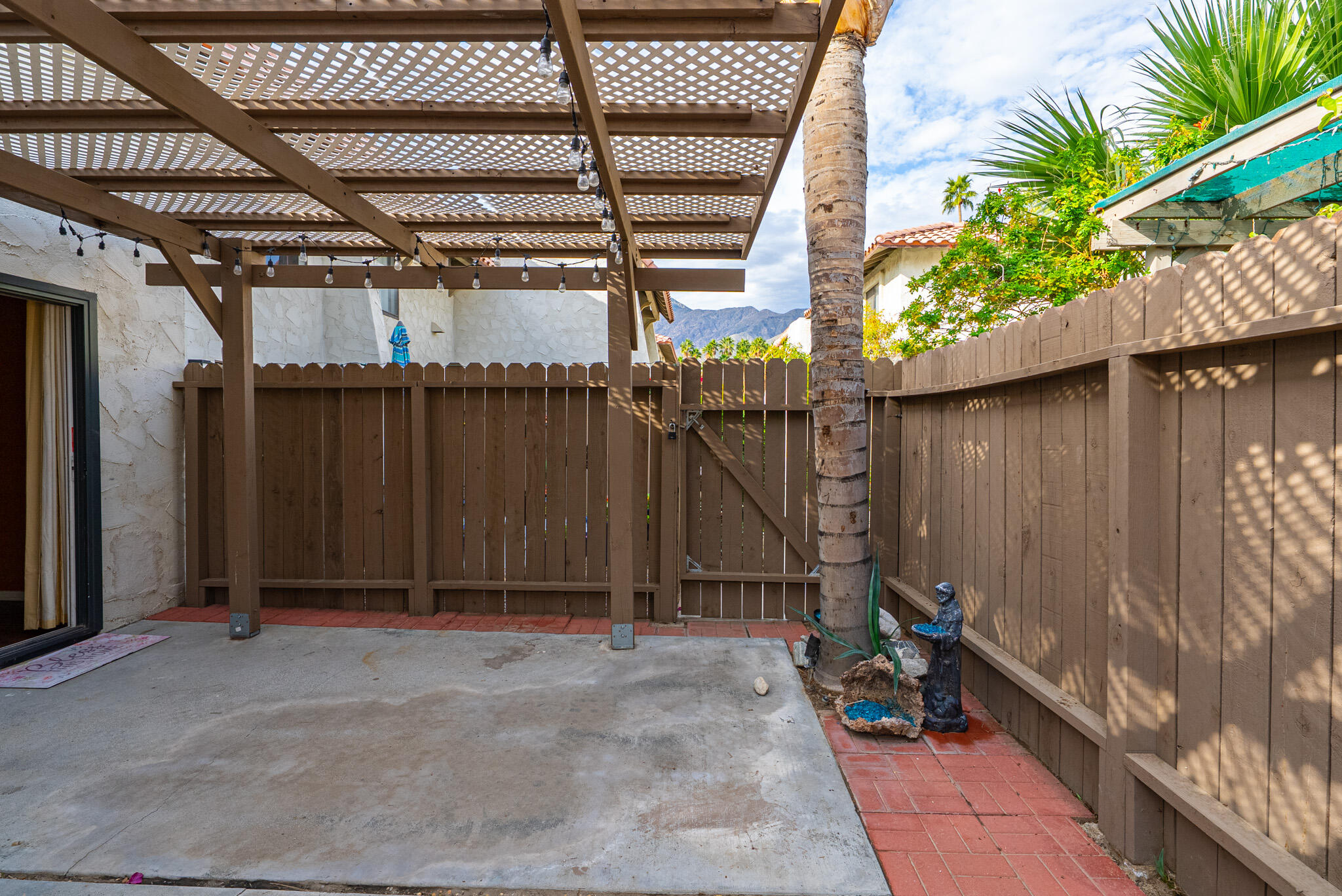 343 West Mariscal Road Palm Springs, CA 92262 - Photo 19 of 32 a view of backyard with potted plants