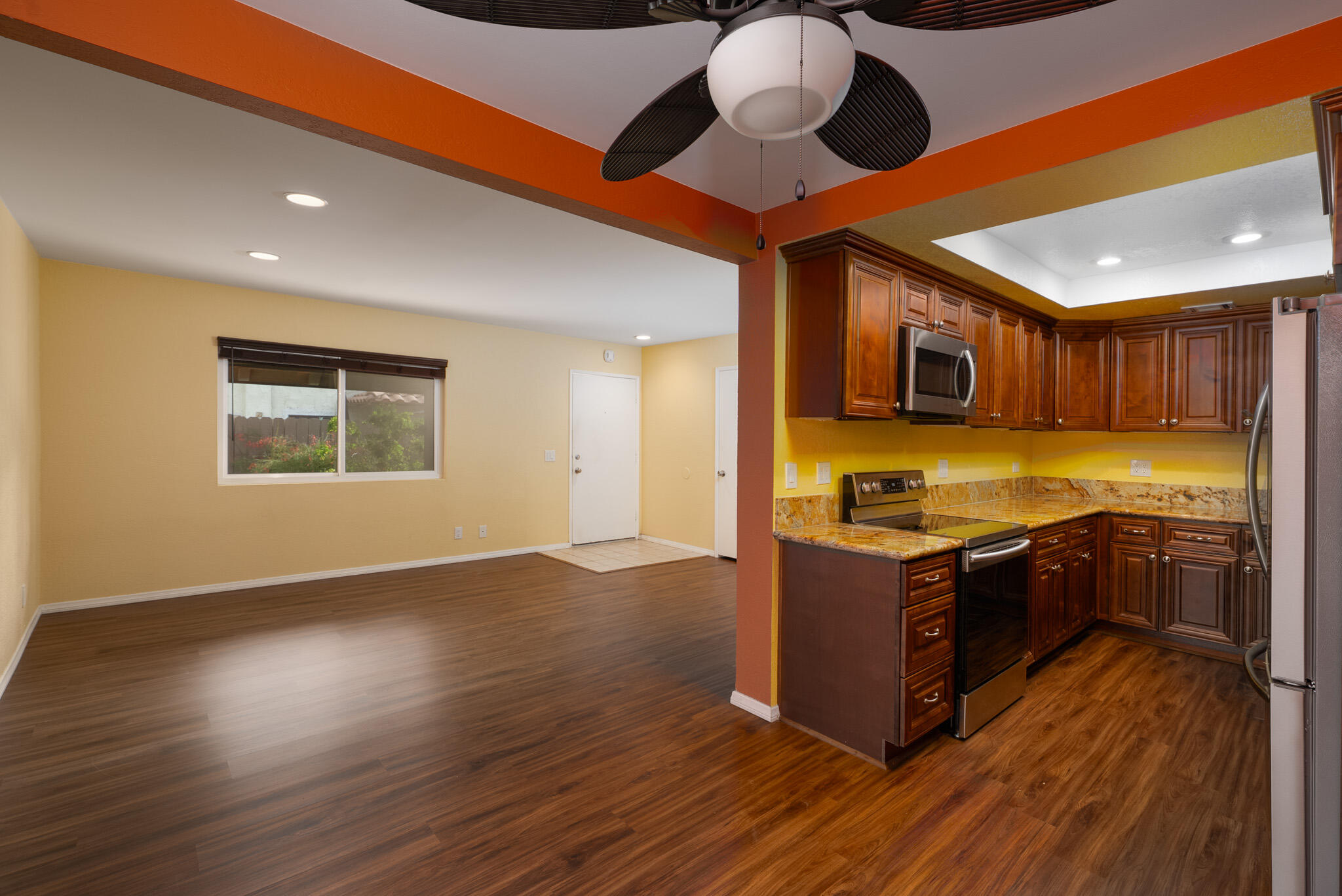 343 West Mariscal Road Palm Springs, CA 92262 - Photo 2 of 32 a large kitchen with stainless steel appliances granite countertop a stove and a wooden floors