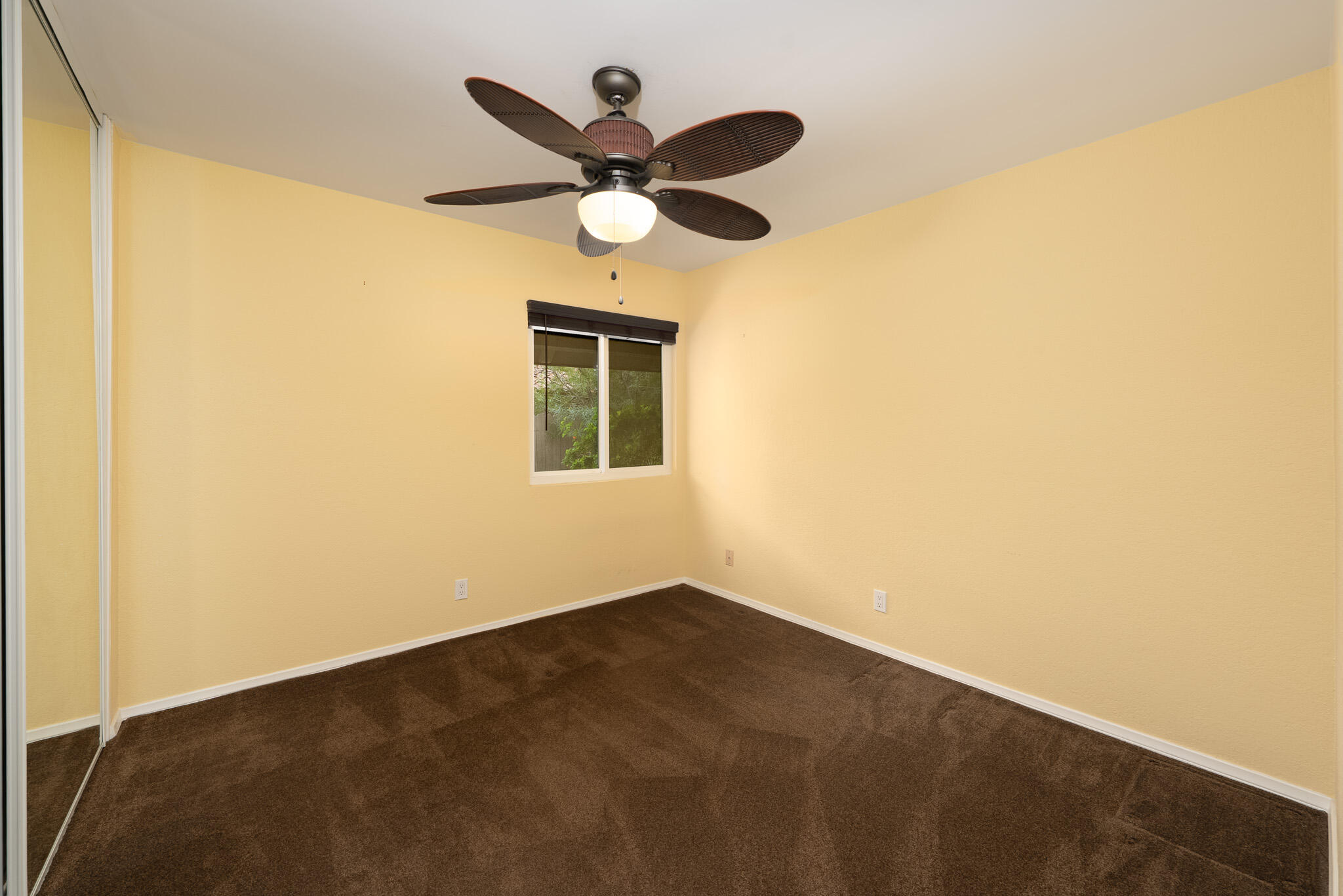 343 West Mariscal Road Palm Springs, CA 92262 - Photo 8 of 32 a view of a big room with wooden floor and windows in a room