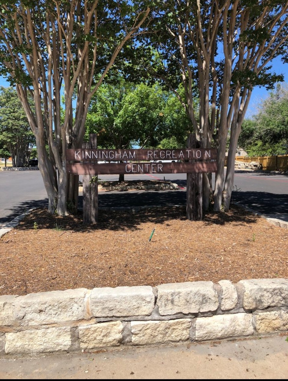2018 Redwing Way Round Rock, TX 78664 - Photo 25 of 27 Stone retaining wall with wood mulch landscaping and mature trees