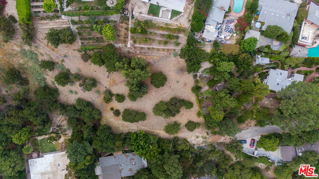 3923 Deer Avenue Sherman Oaks, CA 91423 - Photo 11 of 16 an aerial view of a house with a yard and garden