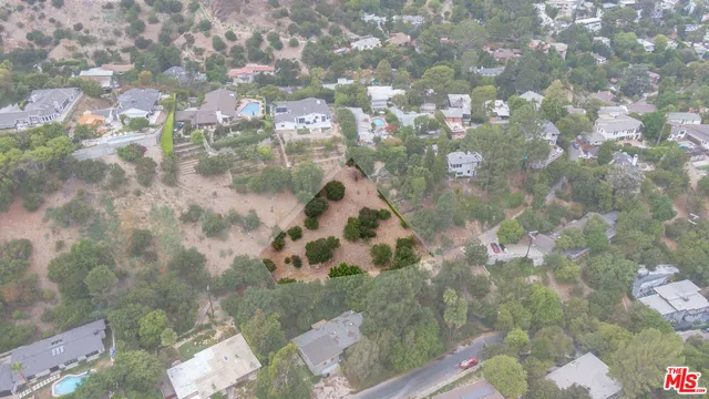 an aerial view of a city with lots of residential buildings