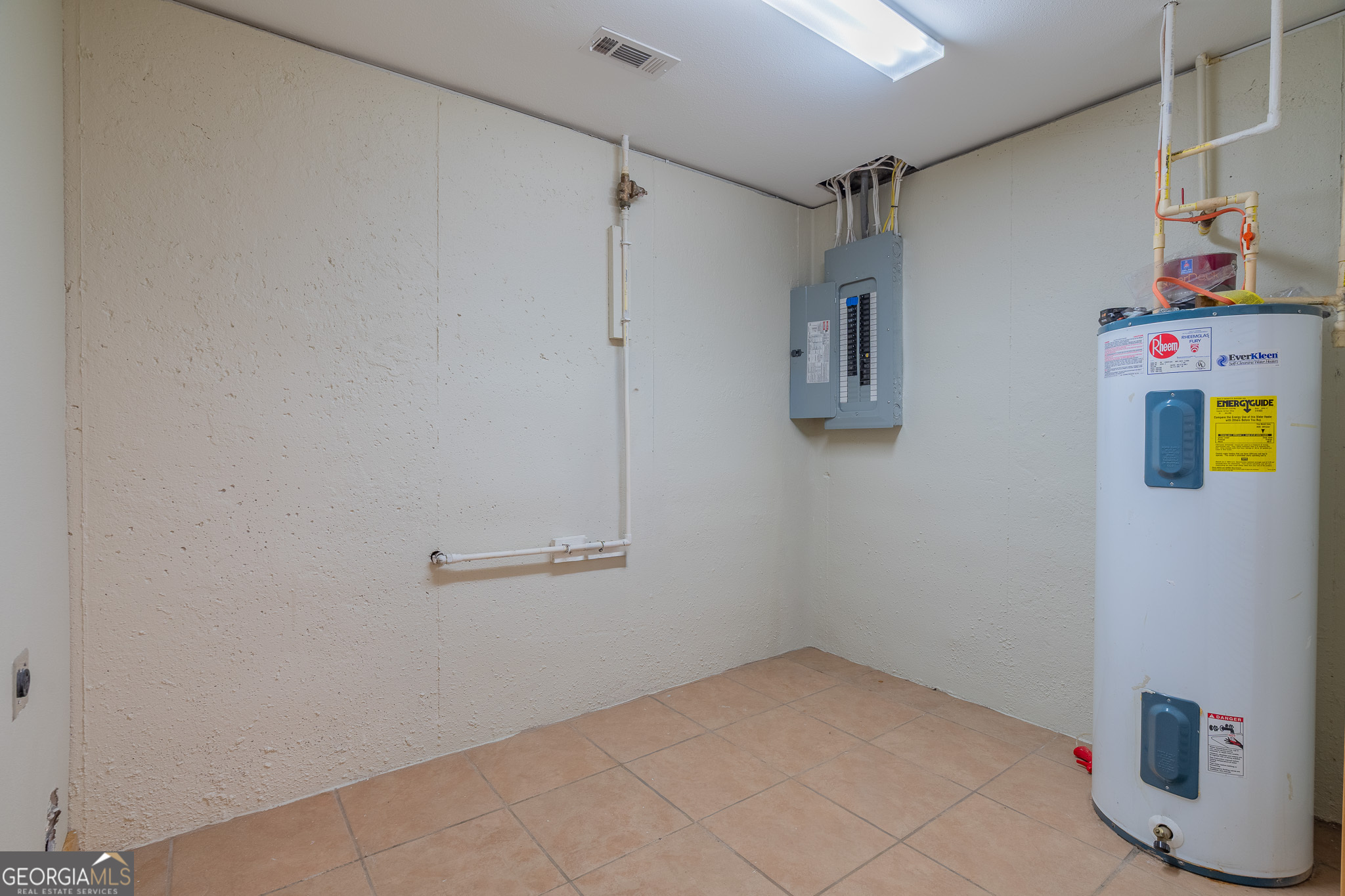 148 Gradient Court Ellijay, GA 30540 - Photo 12 of 28 a view of storage and utility room with racks on the wall