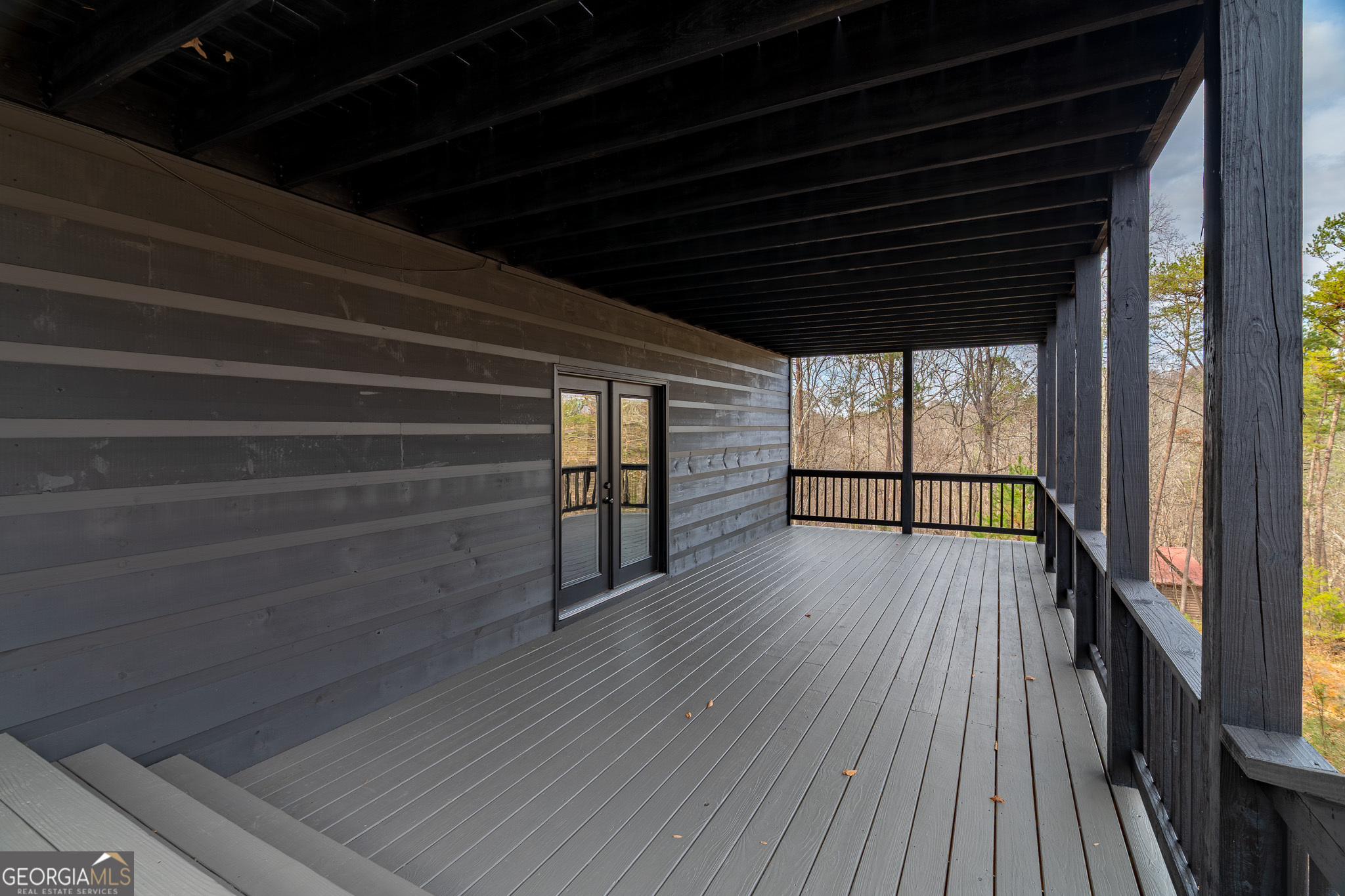 148 Gradient Court Ellijay, GA 30540 - Photo 16 of 28 a view of empty room with wooden floor and fan