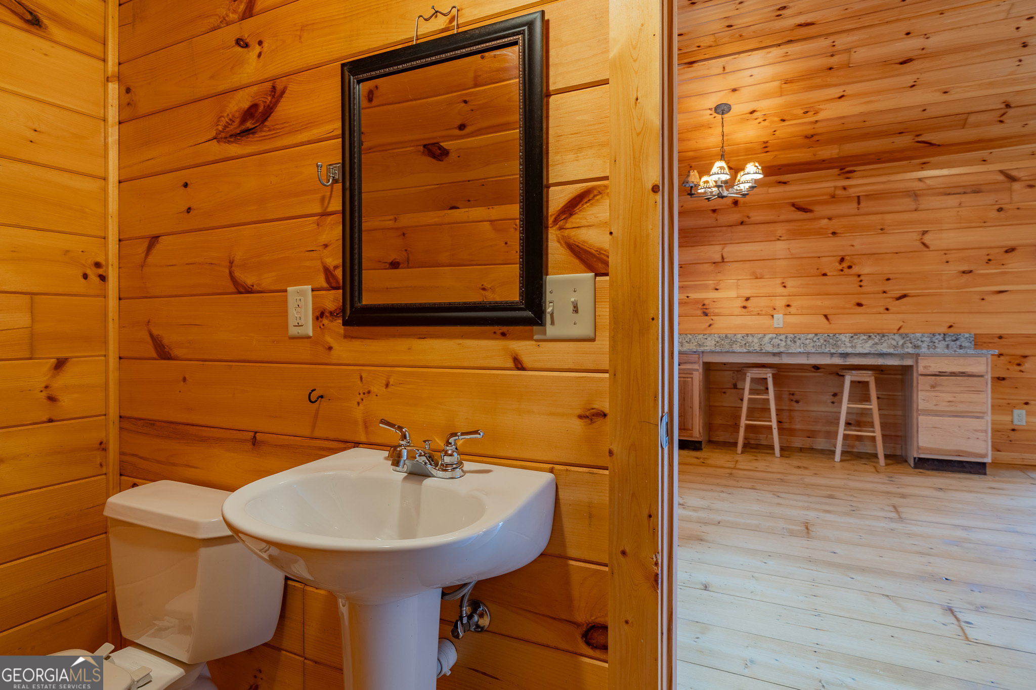 148 Gradient Court Ellijay, GA 30540 - Photo 21 of 28 a bathroom with a sink and a mirror