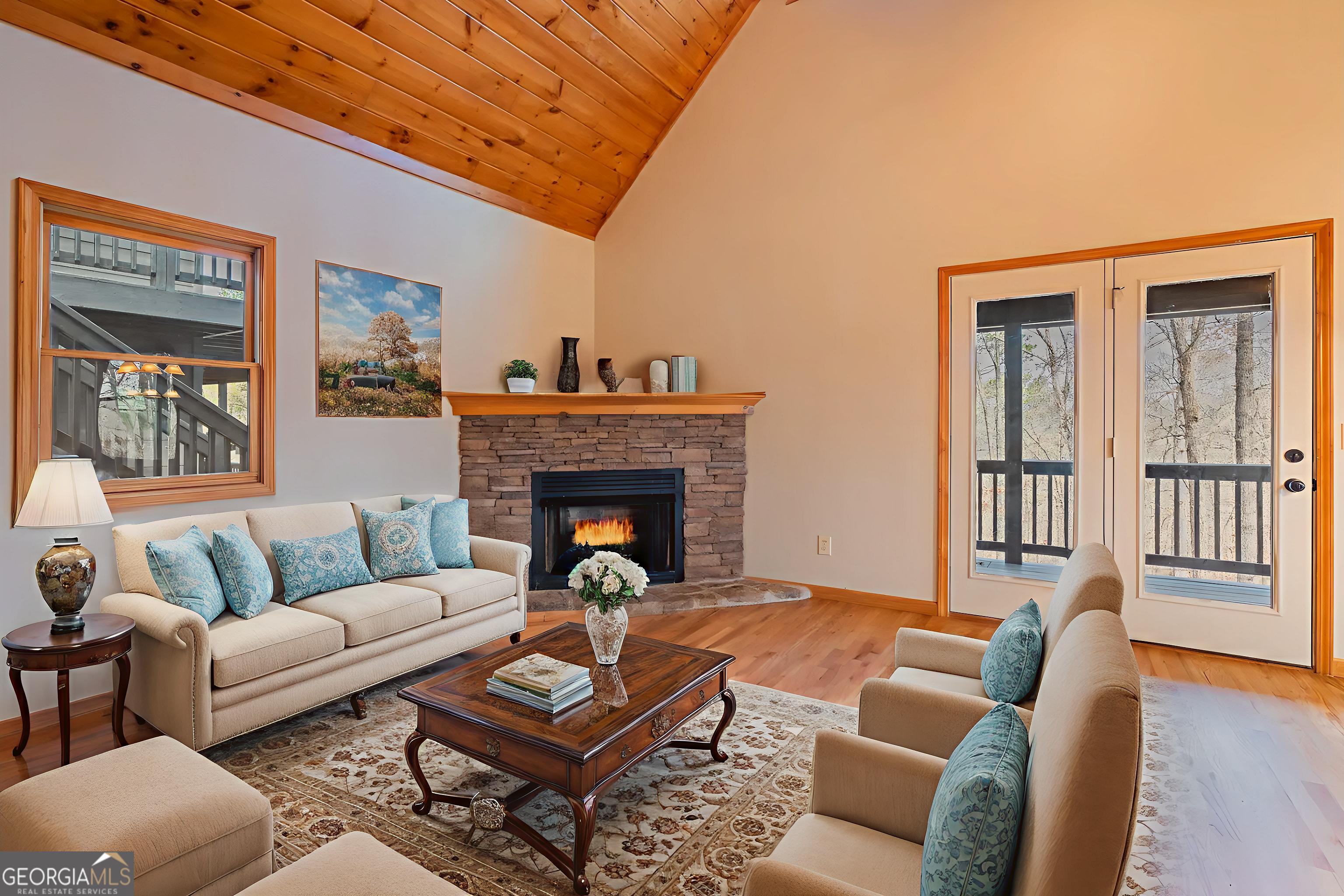 148 Gradient Court Ellijay, GA 30540 - Photo 28 of 28 a living room with furniture and a fireplace