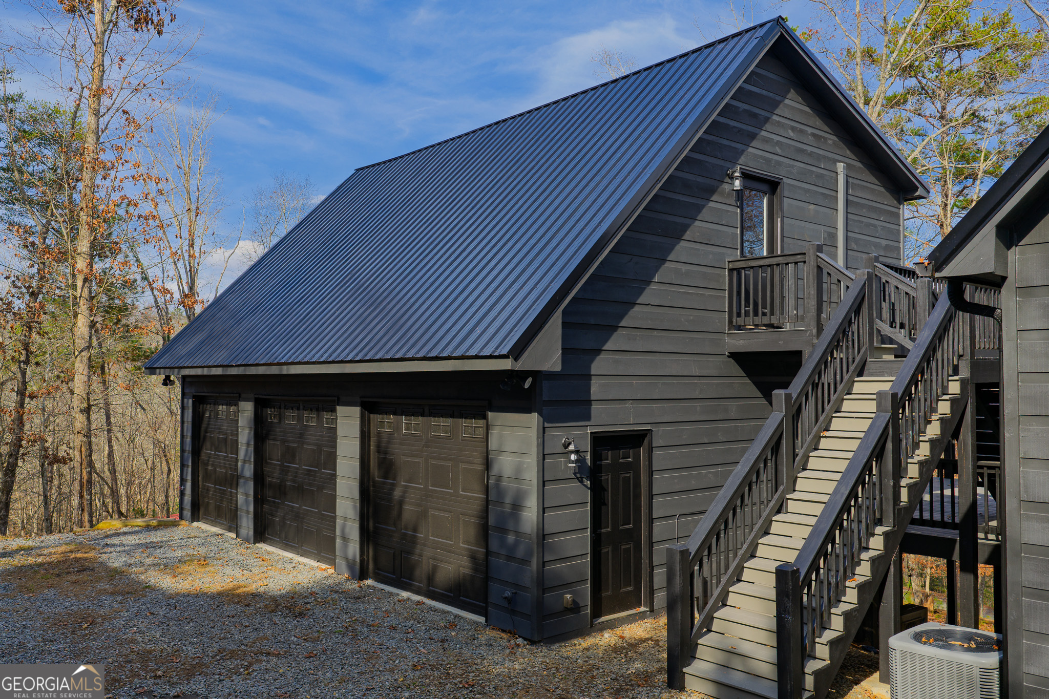 148 Gradient Court Ellijay, GA 30540 - Photo 4 of 28 a view of a house with wooden stairs
