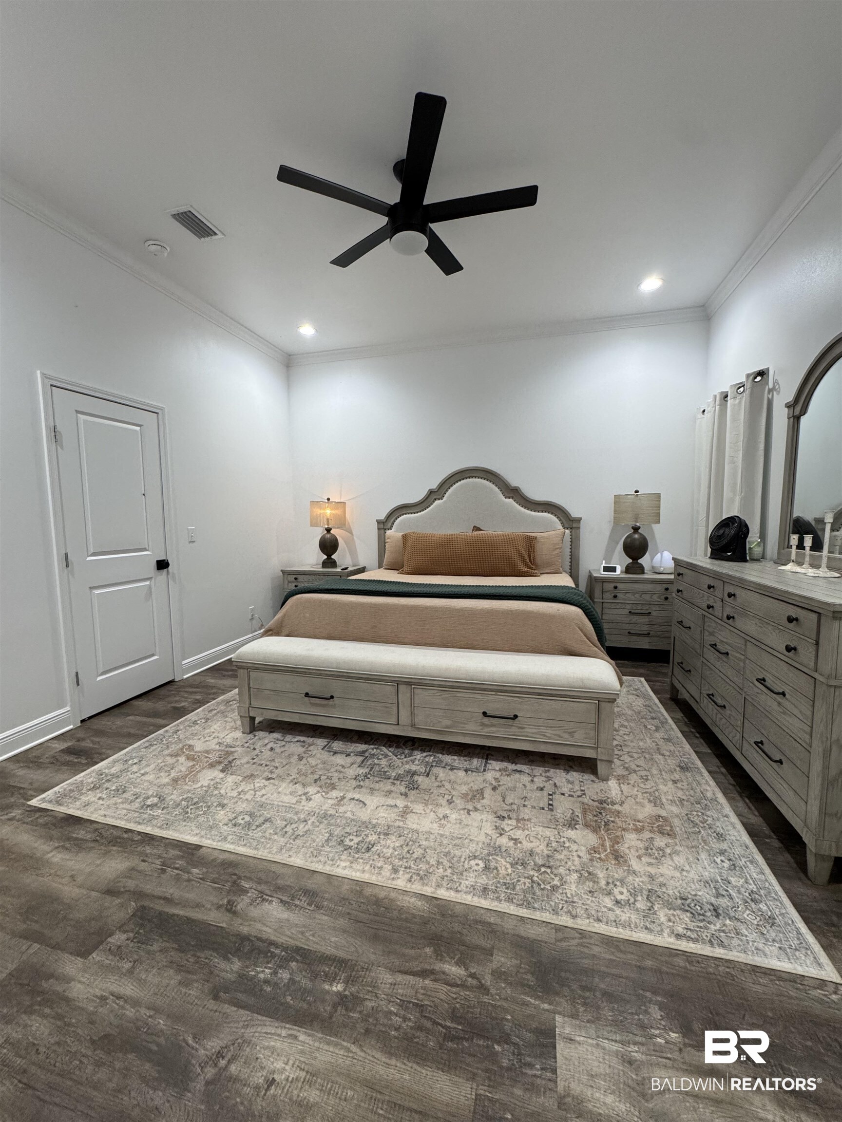 370 Dianne Road Frisco City, AL 36445 - Photo 36 of 41 Bedroom featuring ceiling fan, dark hardwood / wood-style floors, and crown molding