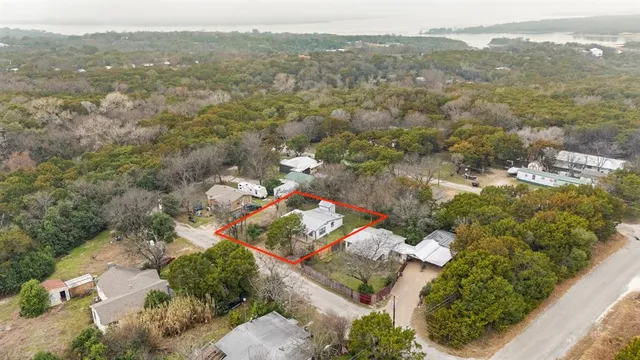 an aerial view of city and mountain view in back