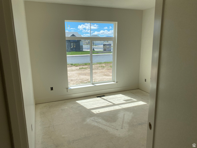 4676 West 75 North, Unit 401 West Point, UT 84015 - Photo 14 of 17 Room featuring a large window with white trim, capturing natural light