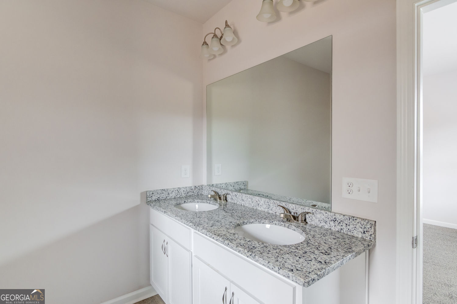 255 Cool Springs Road, Unit ROAD 7 Clarkesville, GA 30523 - Photo 24 of 42 a bathroom with a granite countertop sink and a mirror