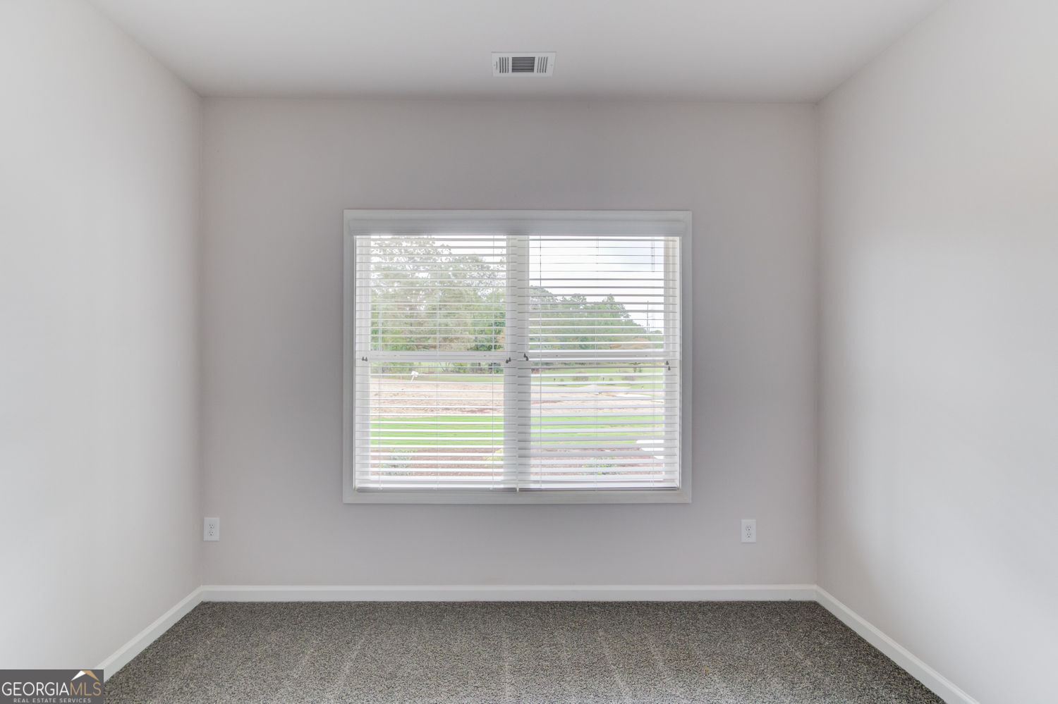 255 Cool Springs Road, Unit ROAD 7 Clarkesville, GA 30523 - Photo 28 of 42 a view of an empty room with a window