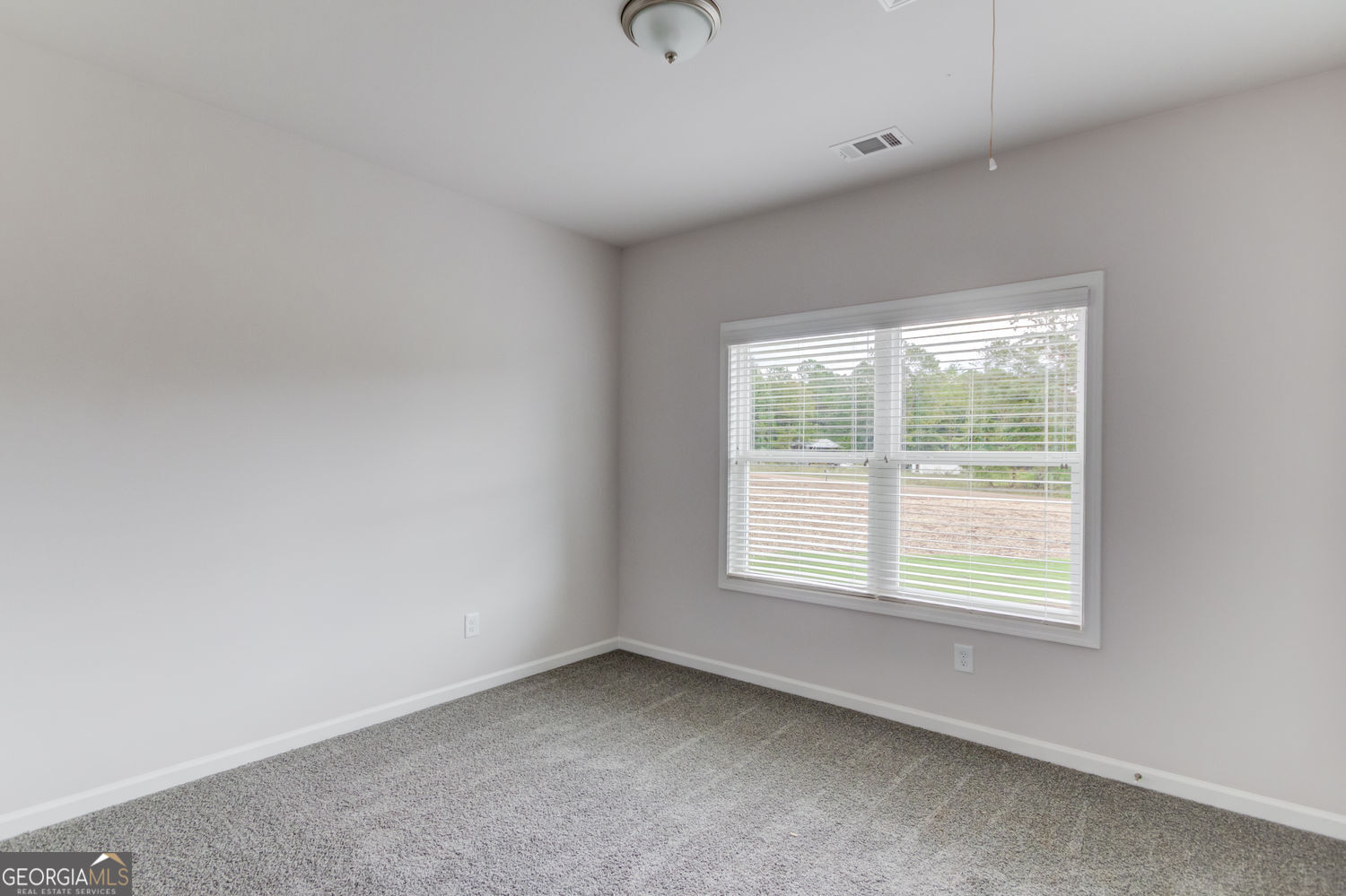 255 Cool Springs Road, Unit ROAD 7 Clarkesville, GA 30523 - Photo 32 of 42 a view of an empty room with a window