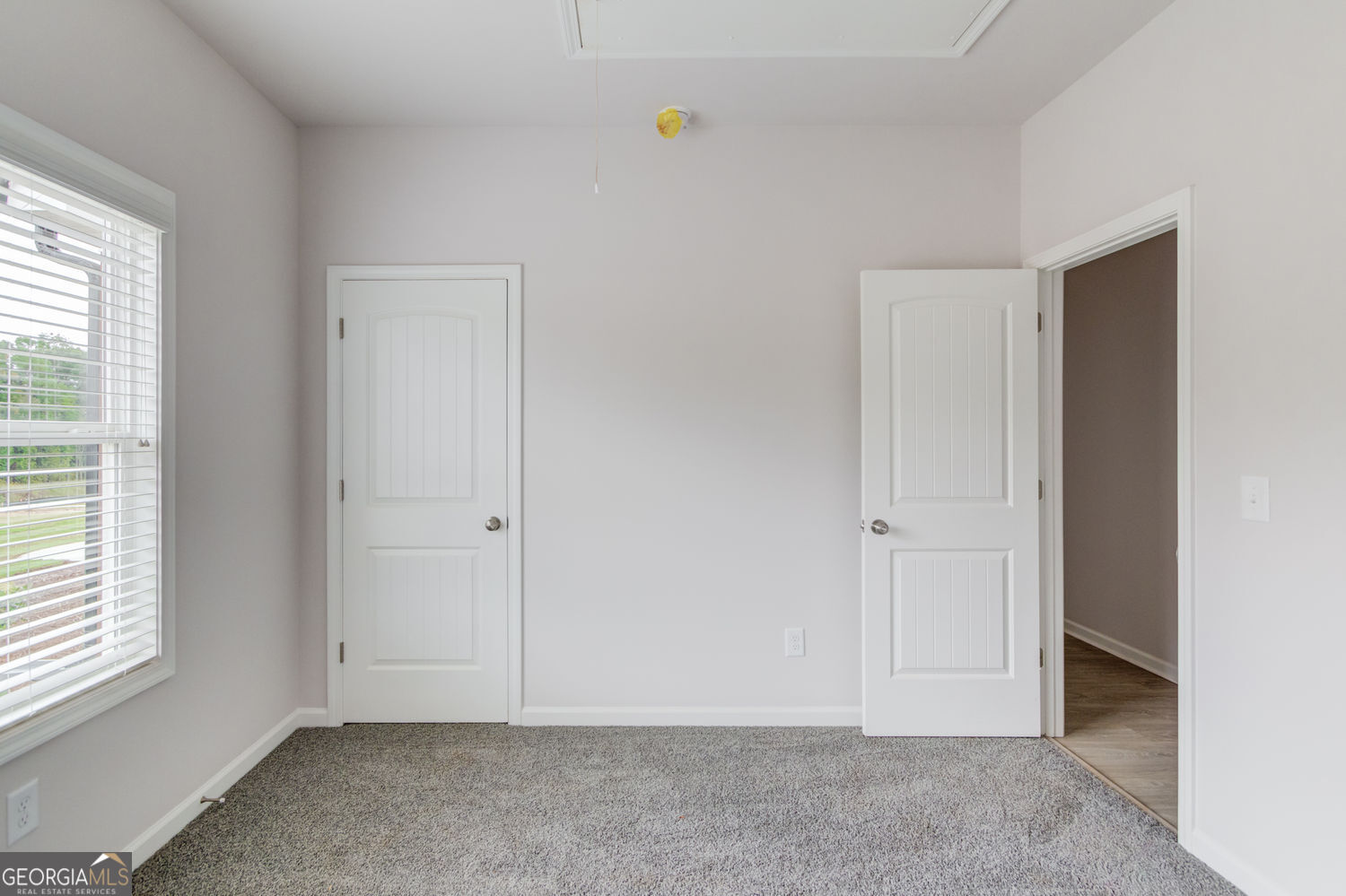 255 Cool Springs Road, Unit ROAD 7 Clarkesville, GA 30523 - Photo 34 of 42 a view of an empty room with windows