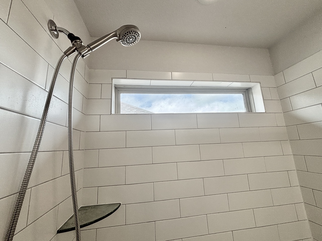 7606 Elk Grove Path Austin, TX 78754 - Photo 21 of 40 Bathroom view of a tile shower