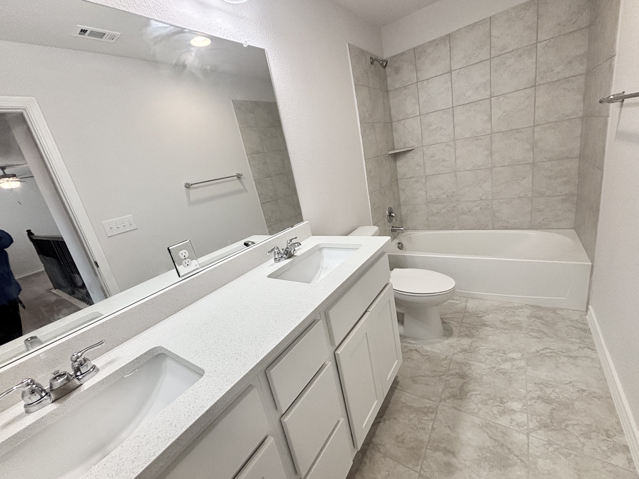 7606 Elk Grove Path Austin, TX 78754 - Photo 26 of 40 Bathroom featuring double vanity, shower / washtub combination, and ceiling fan