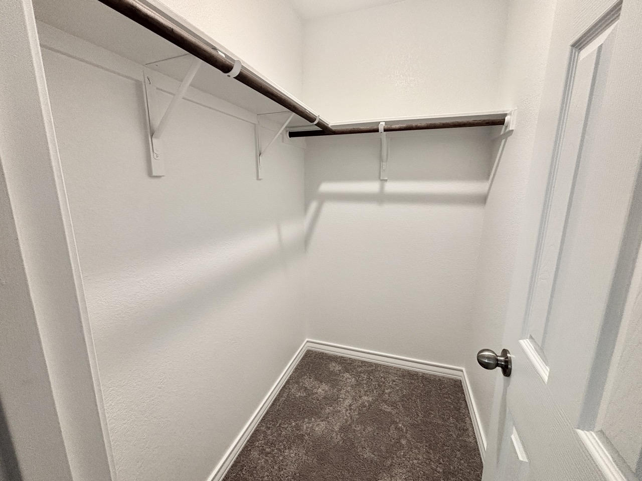 7606 Elk Grove Path Austin, TX 78754 - Photo 28 of 40 Spacious closet featuring carpet floors
