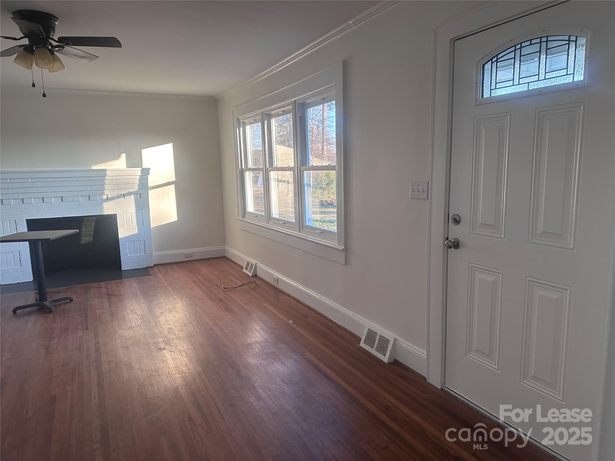 1255 Highway 24 Midland, NC 28107 - Photo 12 of 27 wooden floor in an empty room with a window