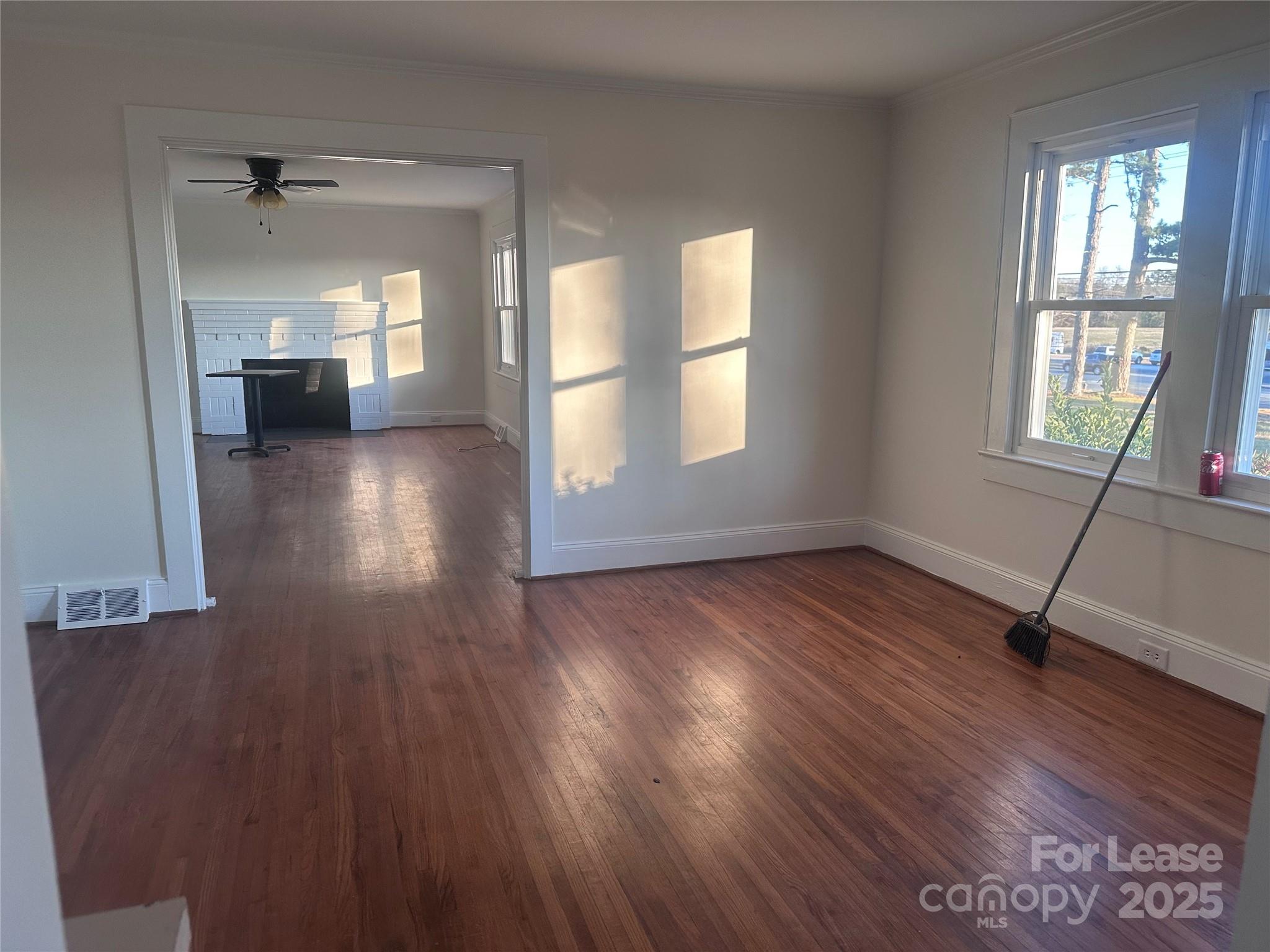 1255 Highway 24 Midland, NC 28107 - Photo 13 of 27 an empty room with wooden floor and windows