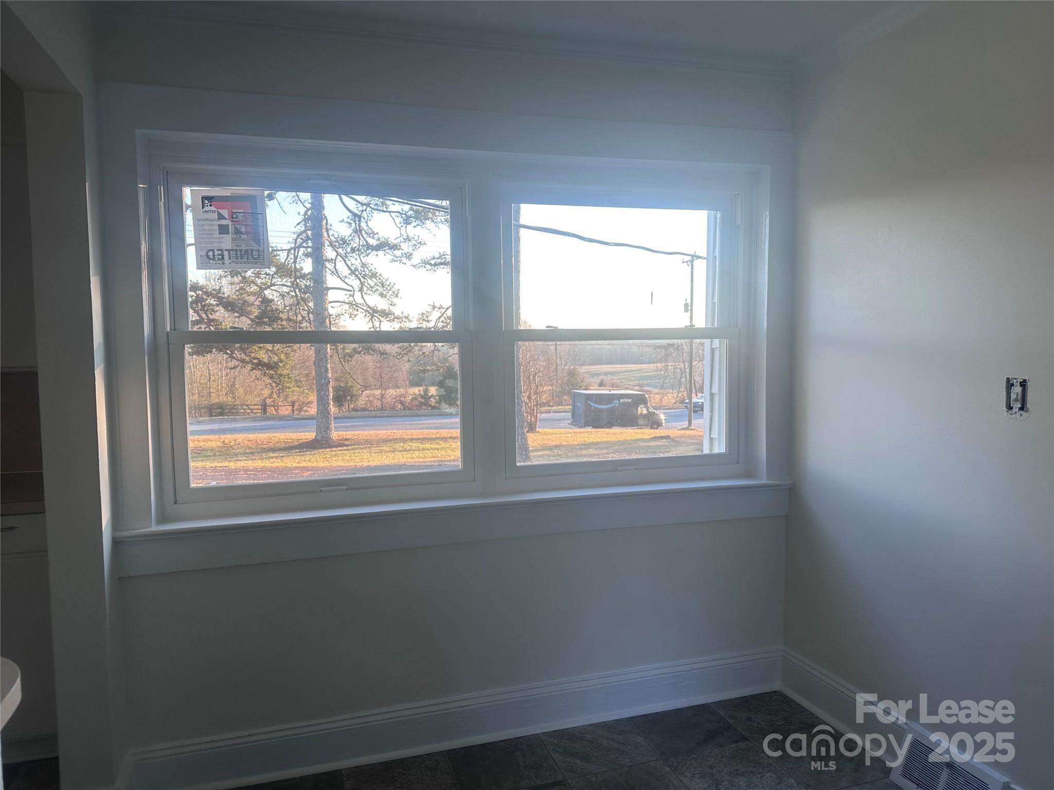 1255 Highway 24 Midland, NC 28107 - Photo 14 of 27 a view of an empty room with a window