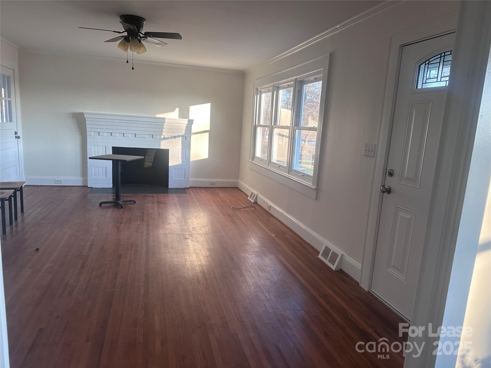 1255 Highway 24 Midland, NC 28107 - Photo 16 of 27 wooden floor in an empty room with a window