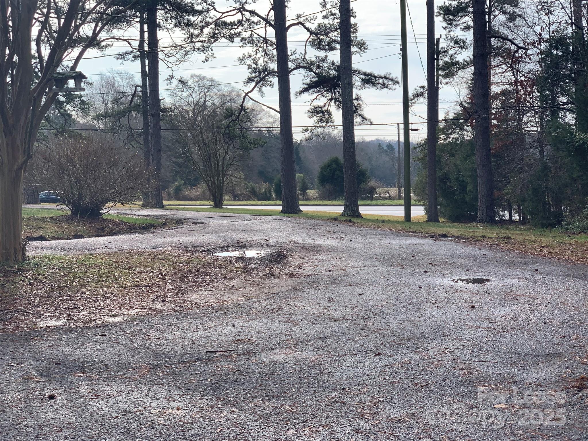 1255 Highway 24 Midland, NC 28107 - Photo 2 of 27 a view of a yard with trees