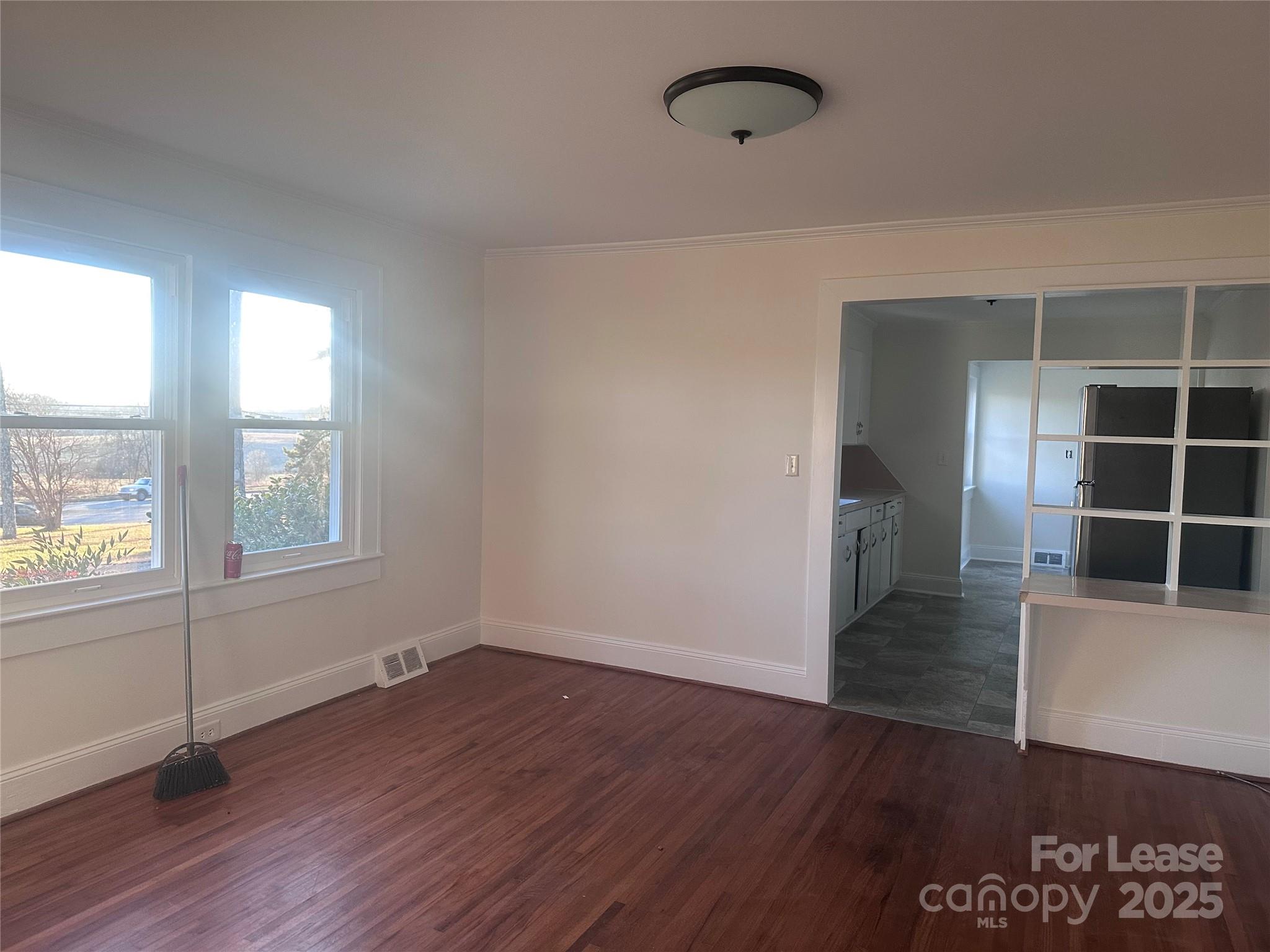 1255 Highway 24 Midland, NC 28107 - Photo 25 of 27 an empty room with wooden floor and windows