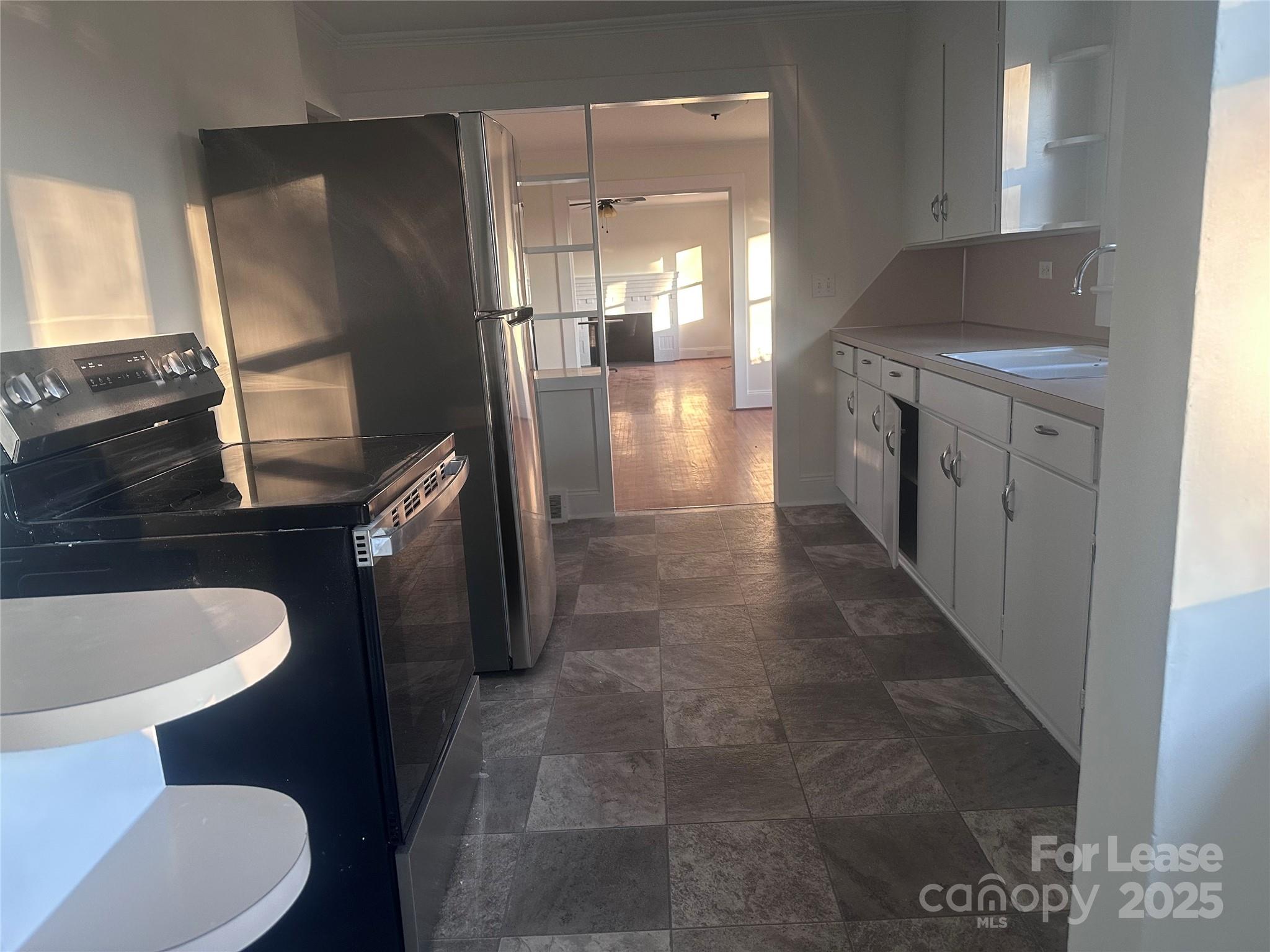 1255 Highway 24 Midland, NC 28107 - Photo 7 of 27 a bathroom with a sink a toilet a mirror and shower