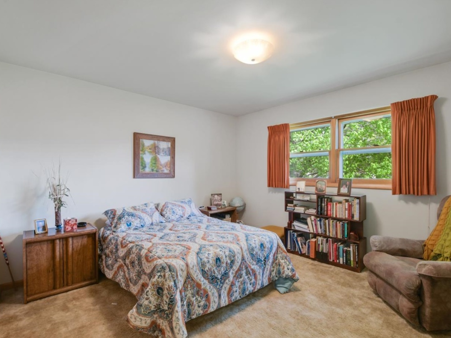 802 Adams Court Monticello, IL 61856 - Photo 12 of 25 a bedroom with a bed and a window