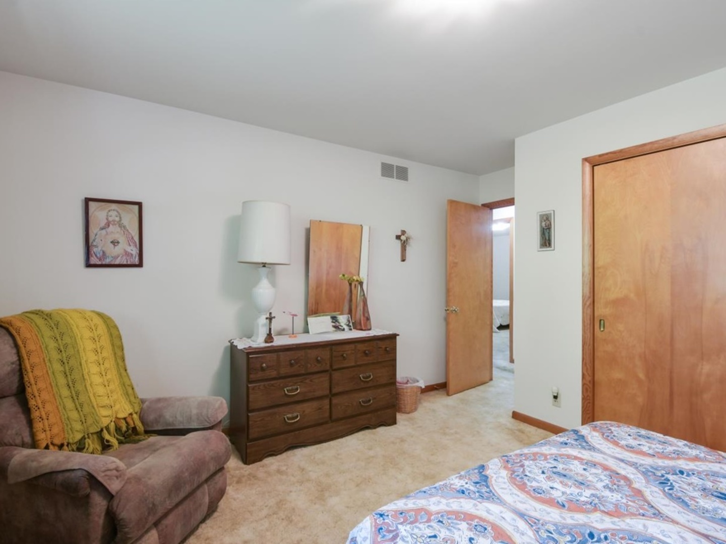 802 Adams Court Monticello, IL 61856 - Photo 13 of 25 a bedroom with a bed and closet