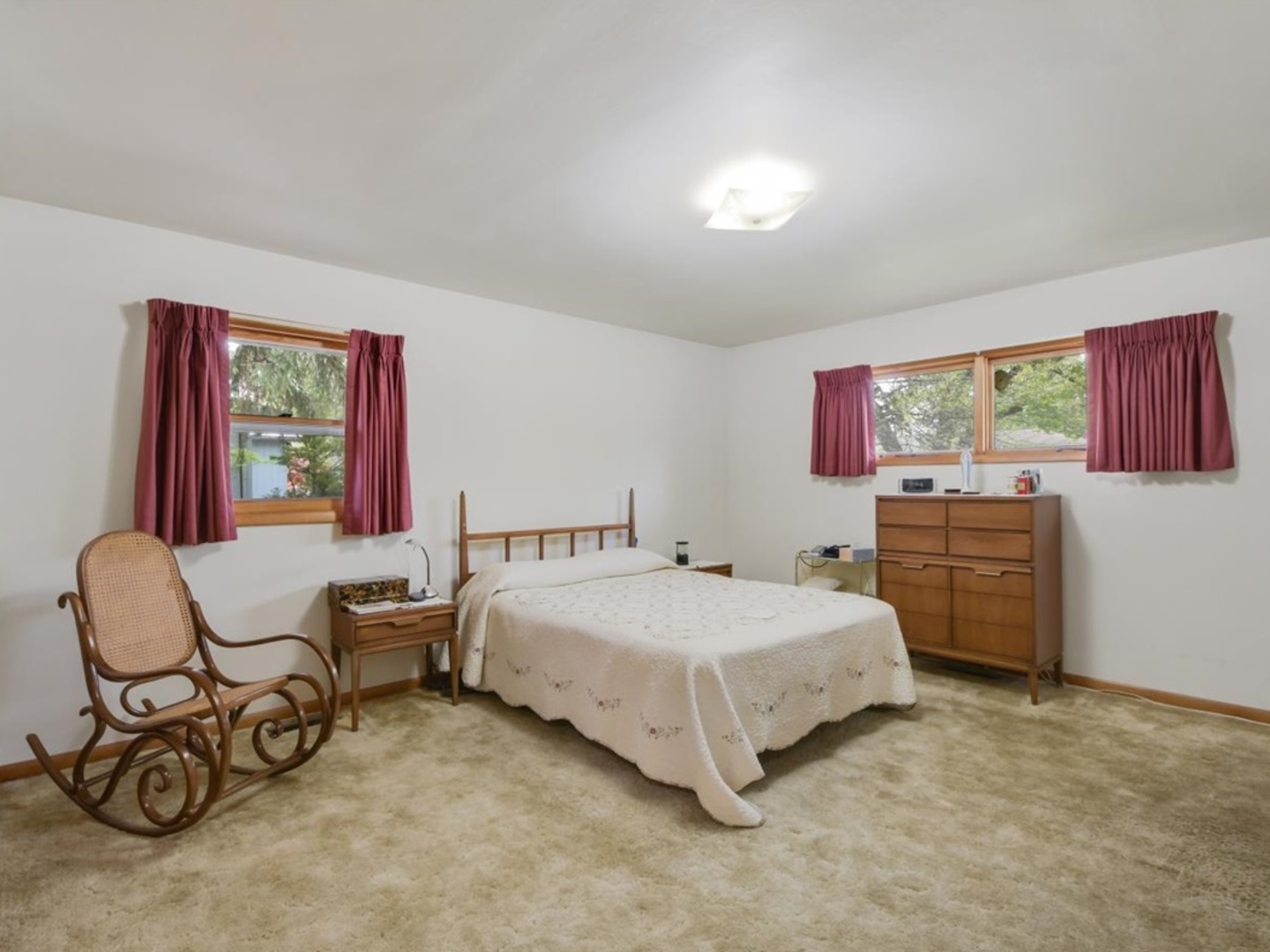 802 Adams Court Monticello, IL 61856 - Photo 16 of 25 a bedroom with a bed chair and window