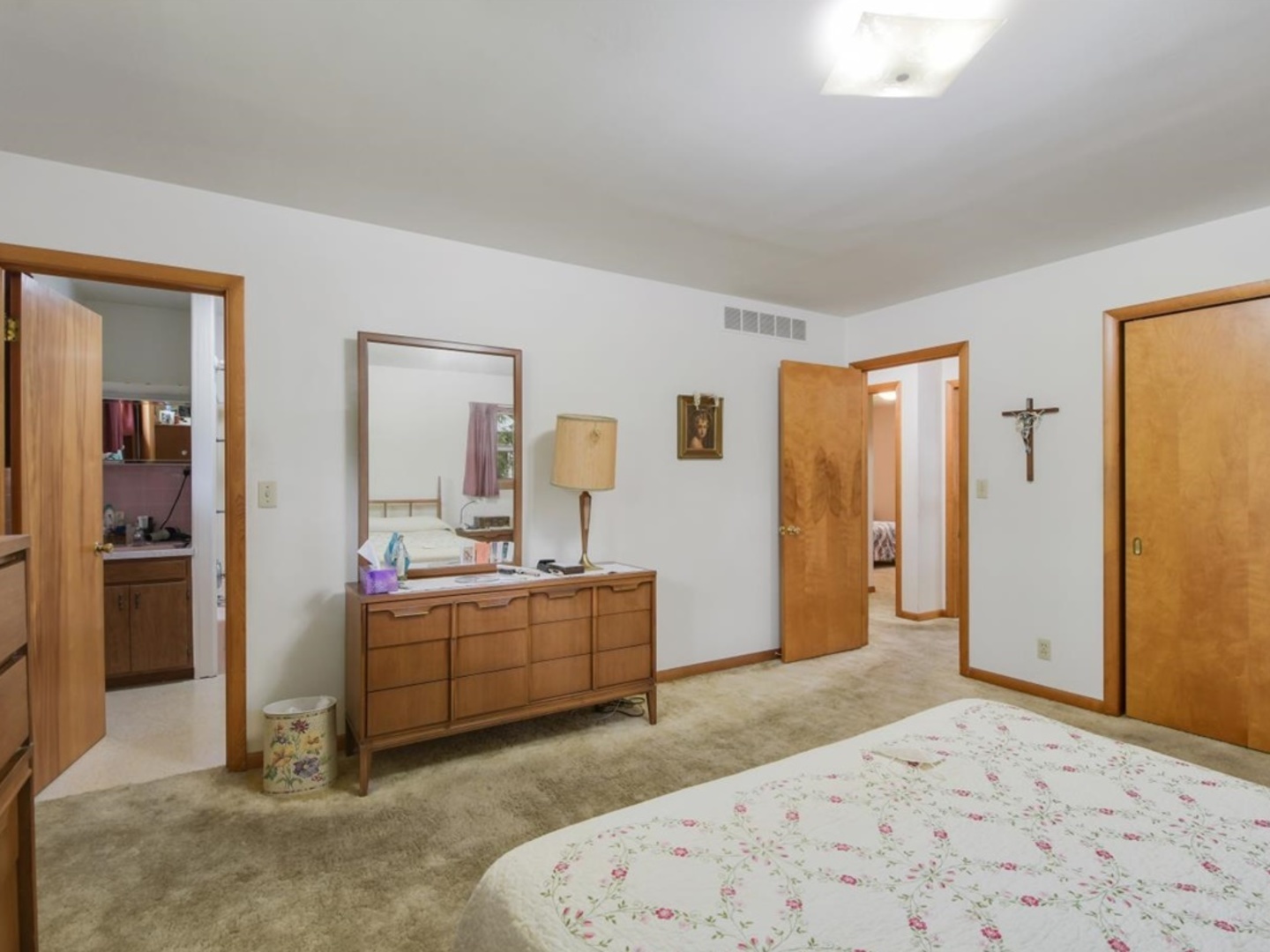 802 Adams Court Monticello, IL 61856 - Photo 17 of 25 a bedroom with a bed and a dresser