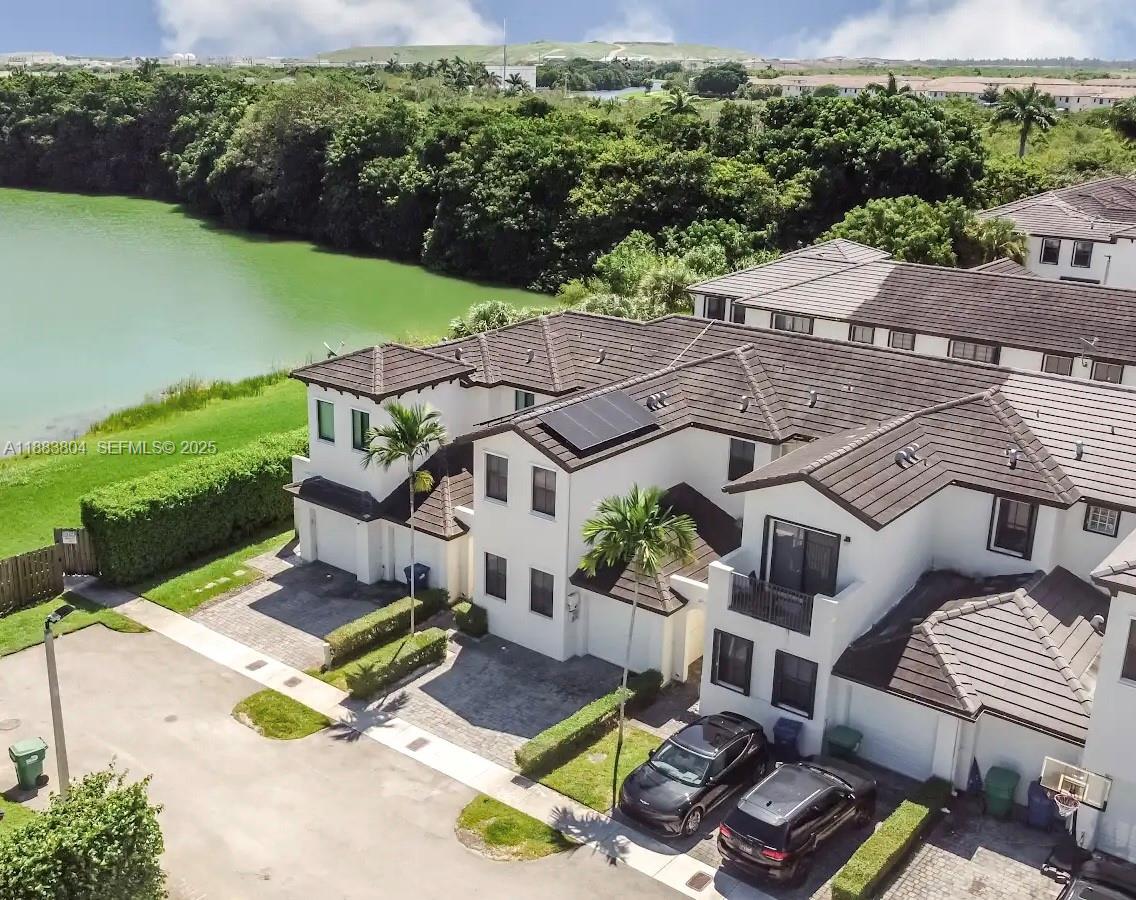 22509 Southwest 102nd Avenue Miami, FL 33190 - Photo 2 of 39 an aerial view of a house with garden space and street view